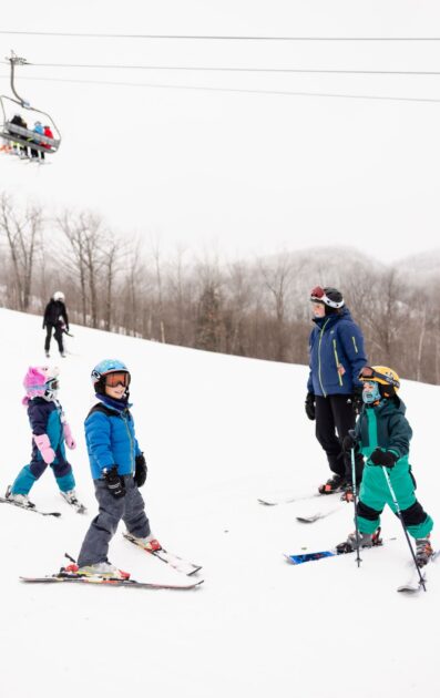 Group of children in a ski lesson