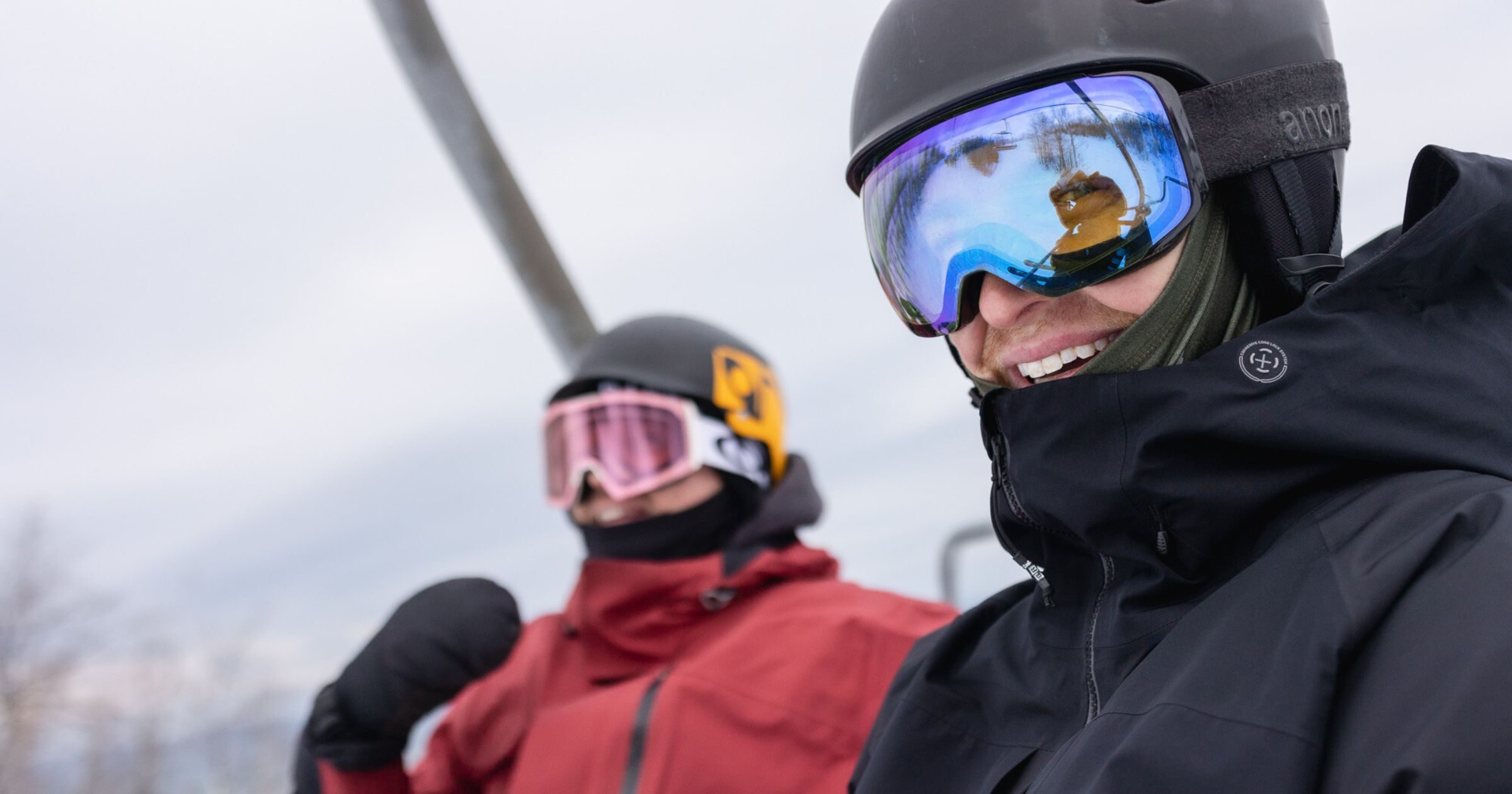 laughing-skiers-on-chairlift