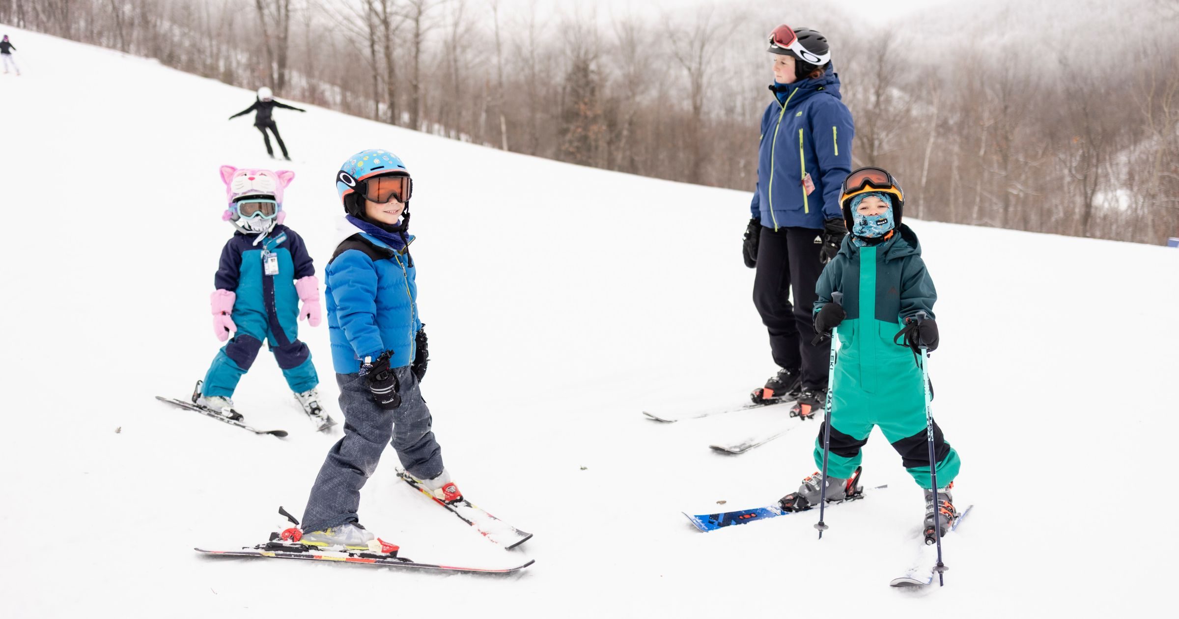 young skiers with instructor